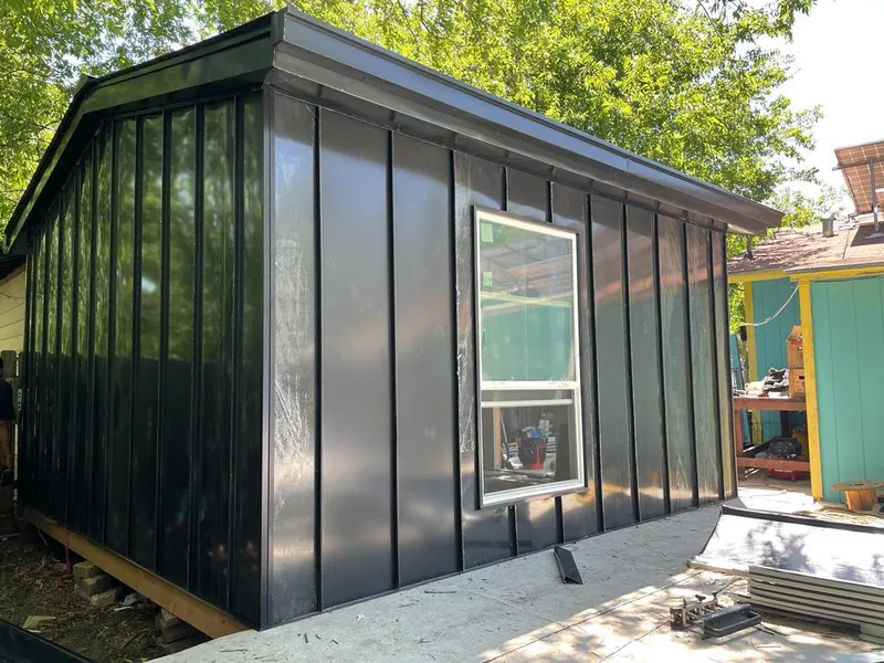 Black standing seam metal wall panels for Metal Roof Installation in Braselton